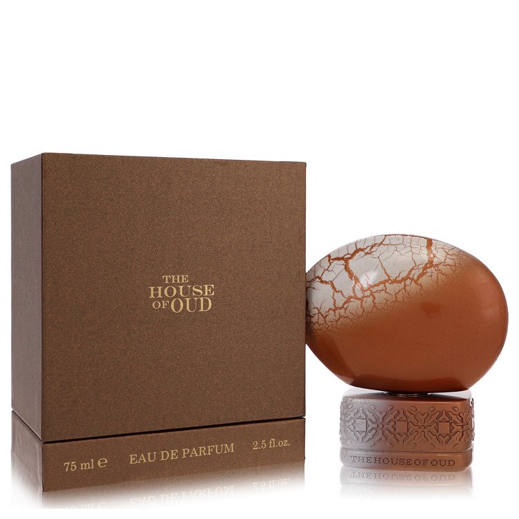 Perfume bottle and packaging of 'The House of Oud' on a white background