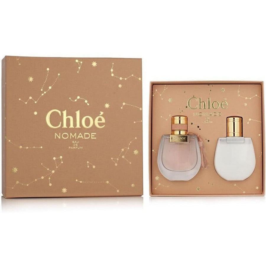 Chloé Nomade Eau de Parfum gift set featuring a brown constellation-patterned box and an open matching box containing two perfume bottles with gold caps.