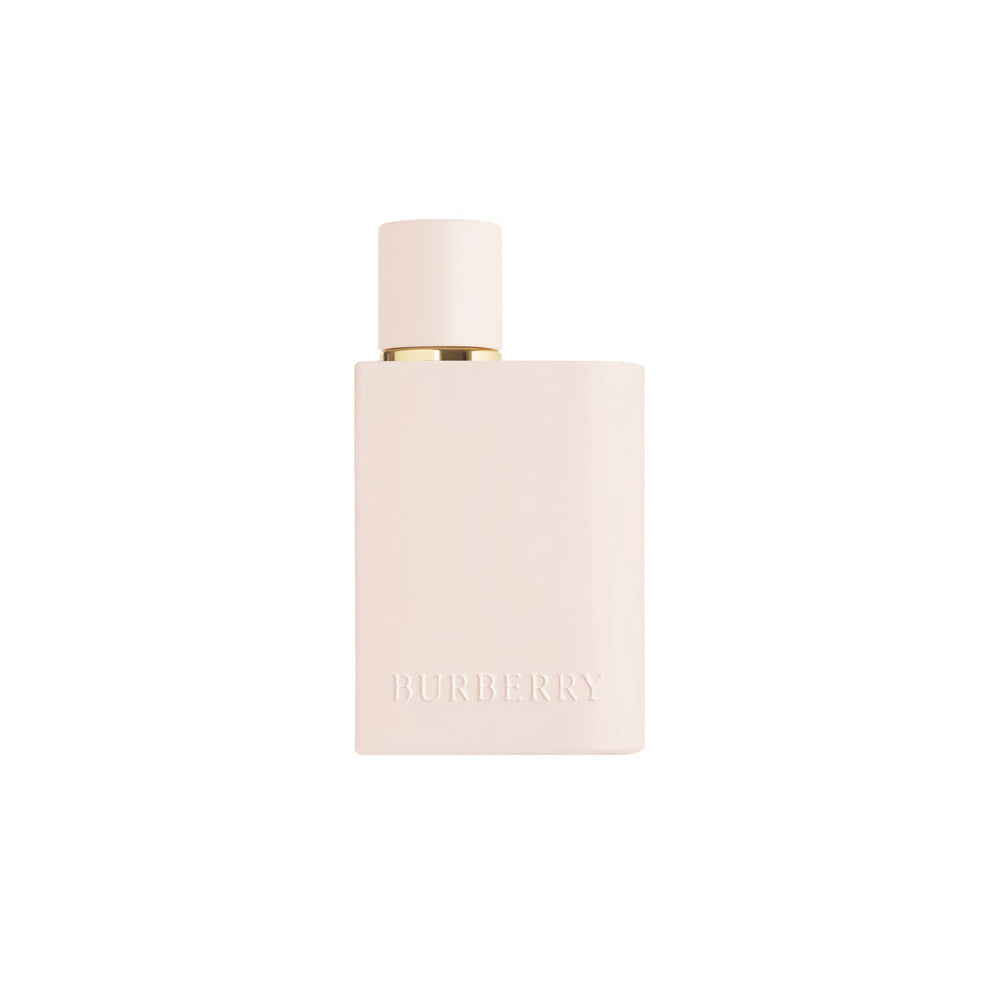A pale blush pink rectangular perfume bottle with a matching cylindrical cap and a thin gold collar, centered on a plain white background. The Burberry name is embossed near the bottom.
