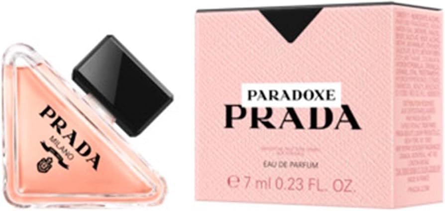 Prada Paradoxe Milano Eau de Parfum shown with its pink box and the triangular glass perfume bottle with a black cap on a white background.