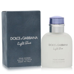 Dolce & Gabbana Light Blue Pour Homme Eau de Toilette bottle next to its dark blue-gray packaging box, on a white background.
