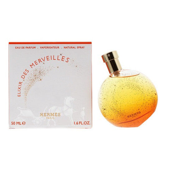 Hermes Elixir des Merveilles perfume bottle and packaging on a white background