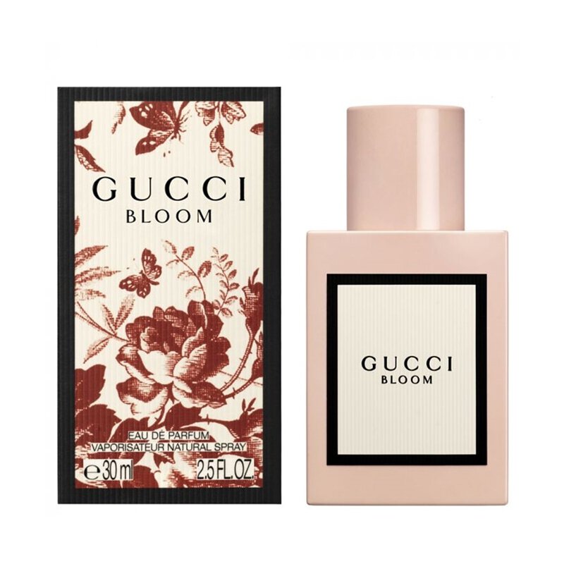 Gucci Bloom perfume bottle and packaging with floral design