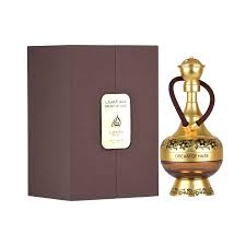 Gold and bronze perfume bottle with 'Lattafa' packaging on a white background
