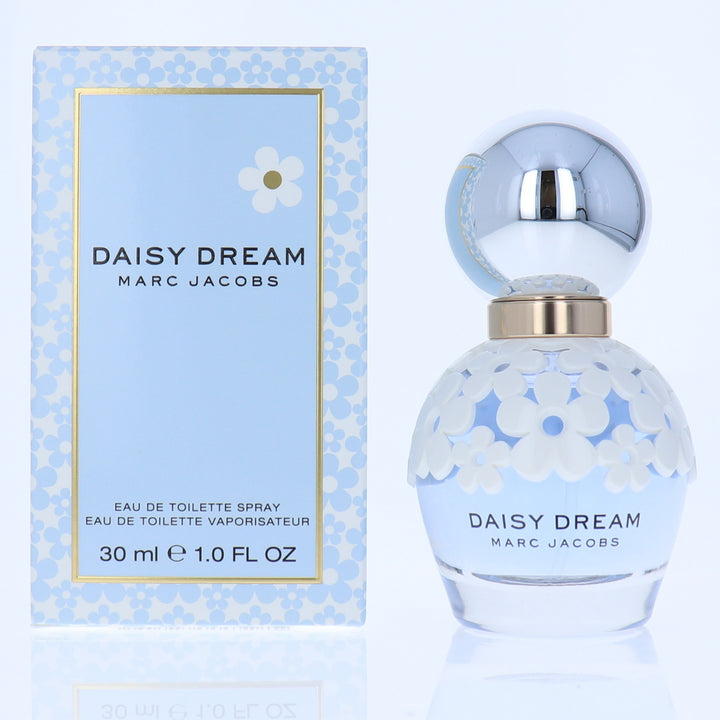 Marc Jacobs Daisy Dream perfume bottle and packaging on a light blue background