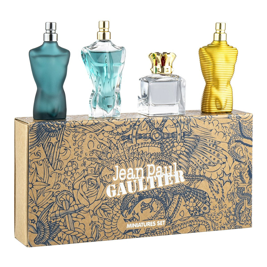 image showing the bottle and packaging for JEAN PAUL GAULTIER 4 PCS MINI SET FOR MEN: LE MALE EDT + LE MALE ELIXIR EDP + SCANDAL EDT + LE BEAU EDT set