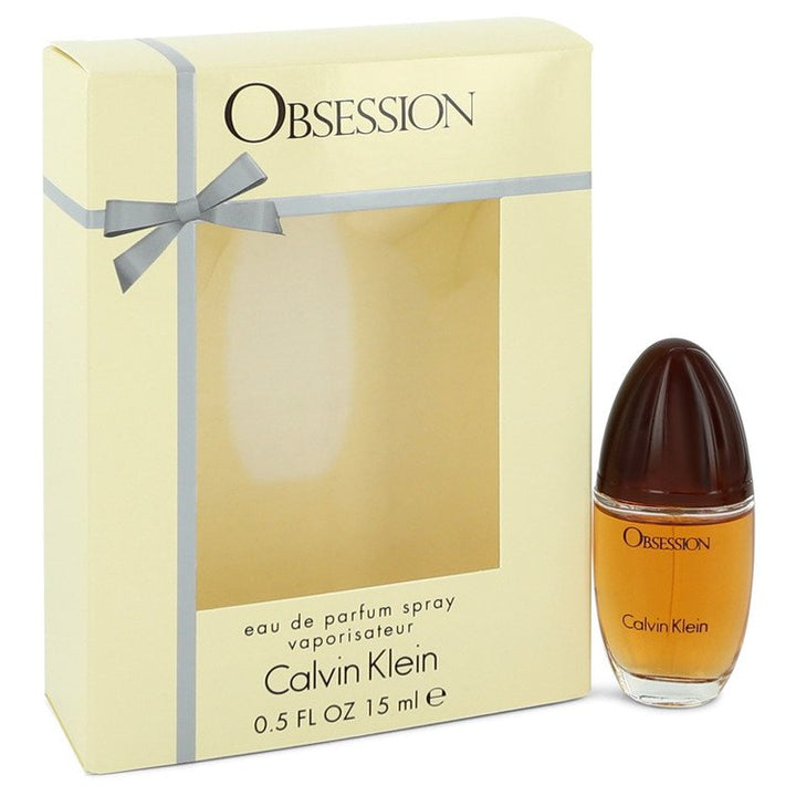 Calvin Klein Obsession perfume bottle and packaging on a white background