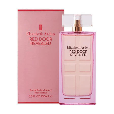 image showing the bottle and packaging for Red Door Revealed Perfume By Elizabeth Arden Eau De Toilette Spray 100ml
