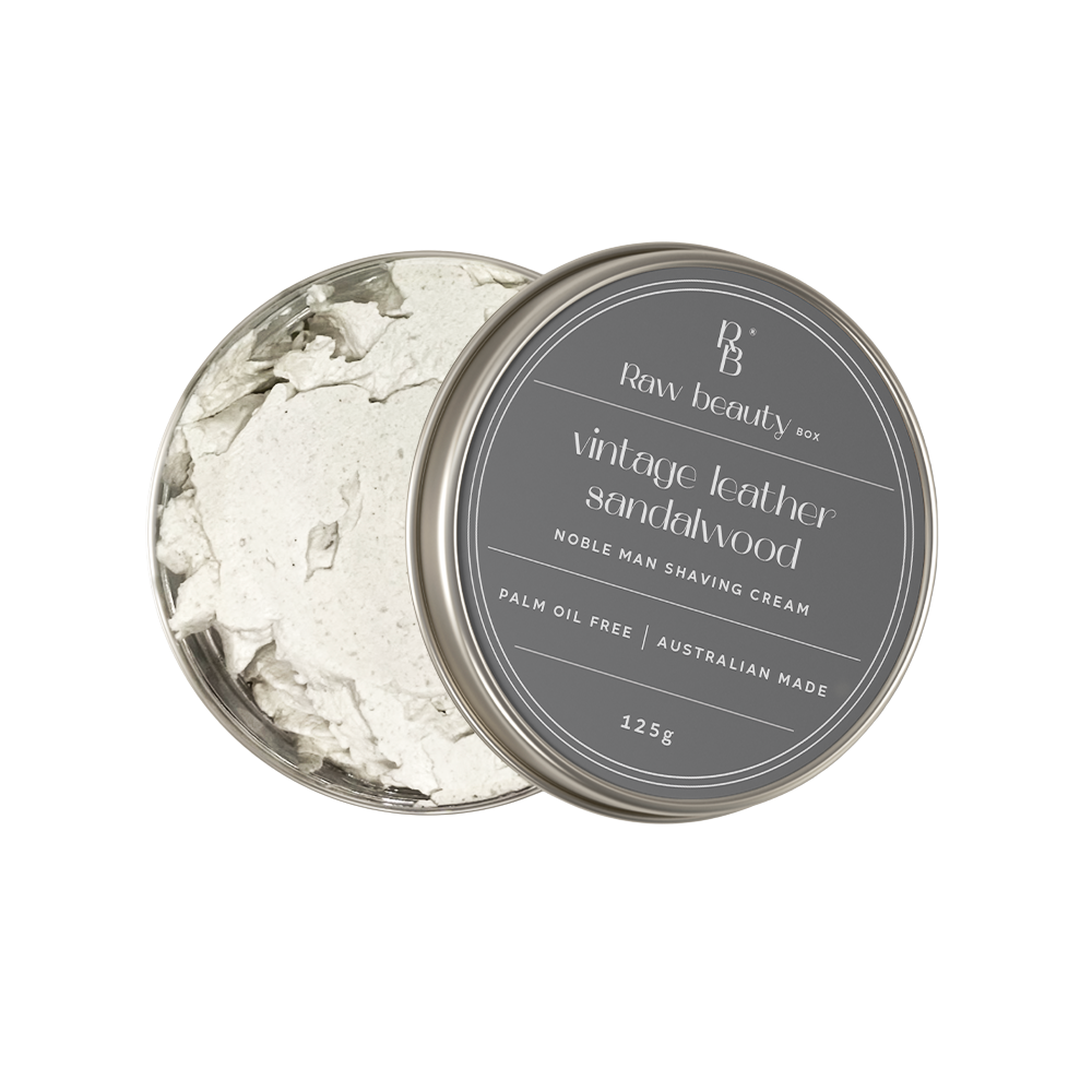 Shaving cream in a metal tin with 'Raw Beauty' branding on a white background