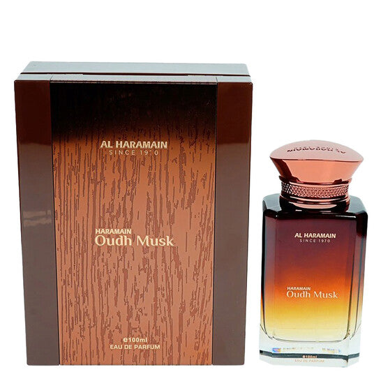 image showing the bottle and packaging for Al Haramain Oudh Musk Cologne By Al Haramain Eau De Parfum Spray 100ml