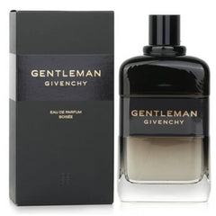 Givenchy Gentleman Boèse Eau de Parfum bottle and its black packaging box, featuring gold lettering on a clean white background.